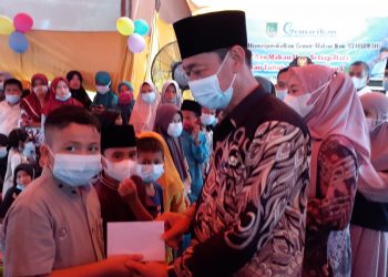 Hadiri Acara Gemarikan, Bupati Rohil Serahkan Santunan