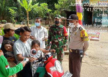 Antisipasi Penularan Covid-19, Babinsa Koramil 03/Bgs Tegakkan Prokes