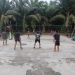 Anggota Satgas TMMD Rohil Ajak Warga Olahraga Volly 