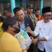 Bupati Rohil Kunjungi Warga Terdampak Banjir di Jalan Siak, Ratusan Paket Sembako Dibagikan